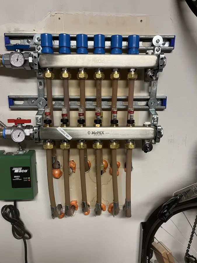 Plumber performing Gas Line Installation at a residential property in Scottdale